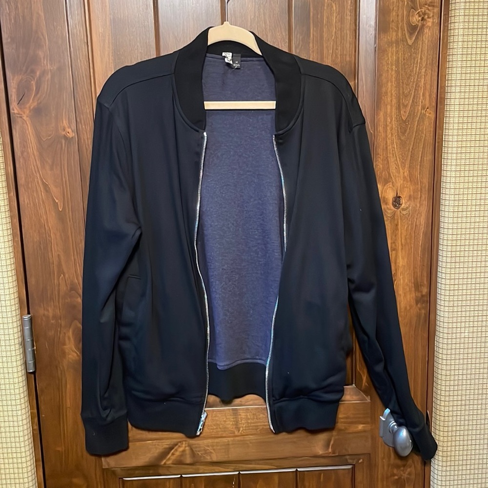 Bomber jacket look but is a zip up sweater